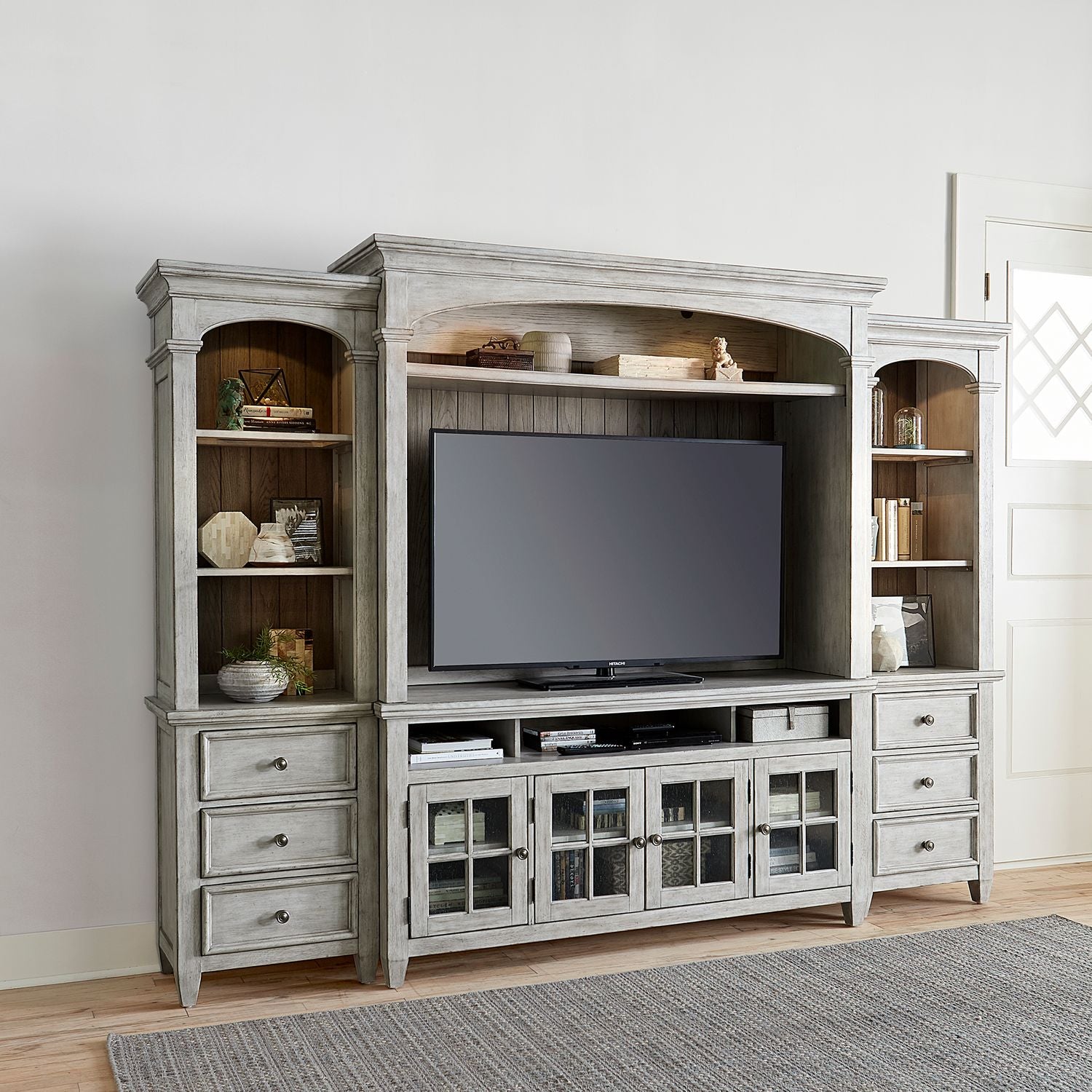 Vaucher Entertainment Center TV Stand with Piers